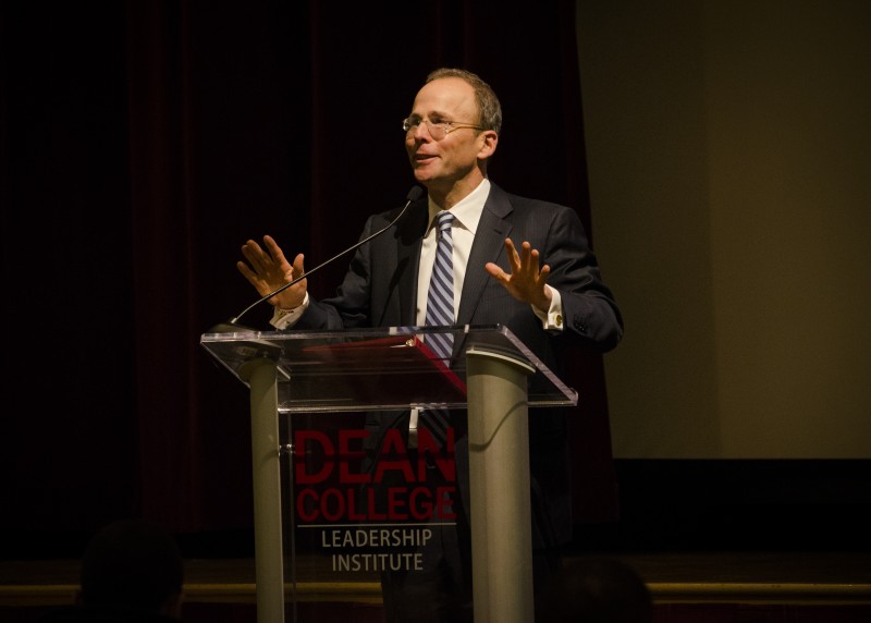 Image of Jonathan Kraft at the podium speaking during the dean leadership institute executive lecture event.