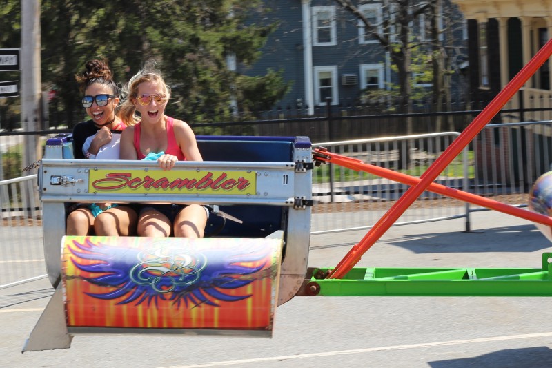 image of two students on a carnival ride during Spring Fling event.